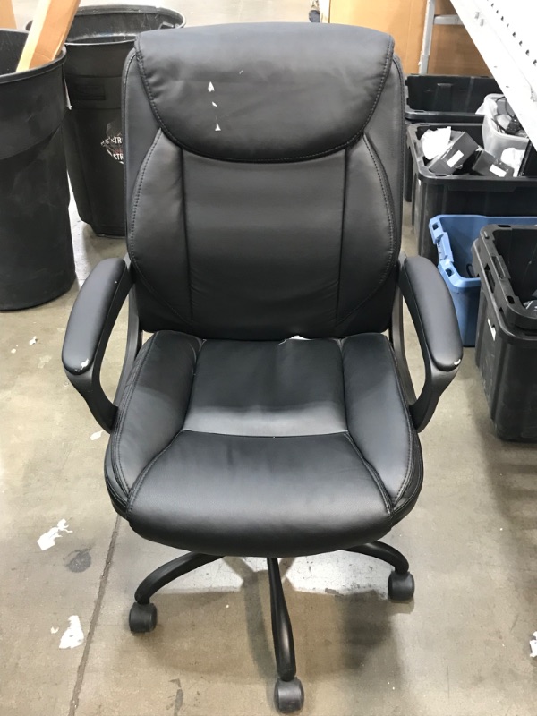 Photo 1 of Black office chair with 5 wheels