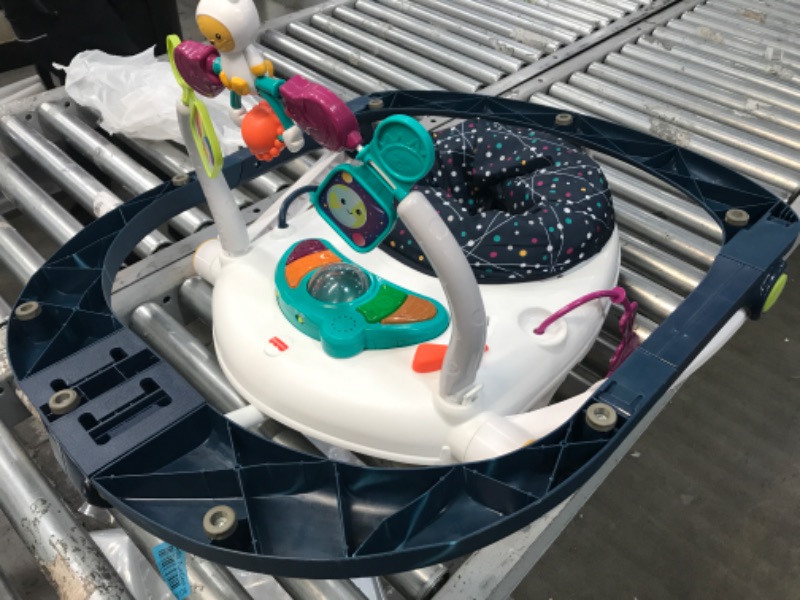 Photo 4 of **MINOR WEAR & TEAR**Fisher-Price Astro Kitty SpaceSaver Jumperoo, Space-Themed Infant Activity Center with Adjustable Bouncing seat, Lights, Music and Interactive Toys