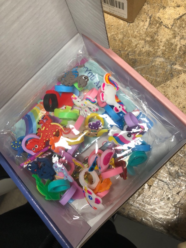 Photo 2 of DASDSA 28 Pack Party Favor Dinosaur Unicorn Flamingo Mermaid Ring