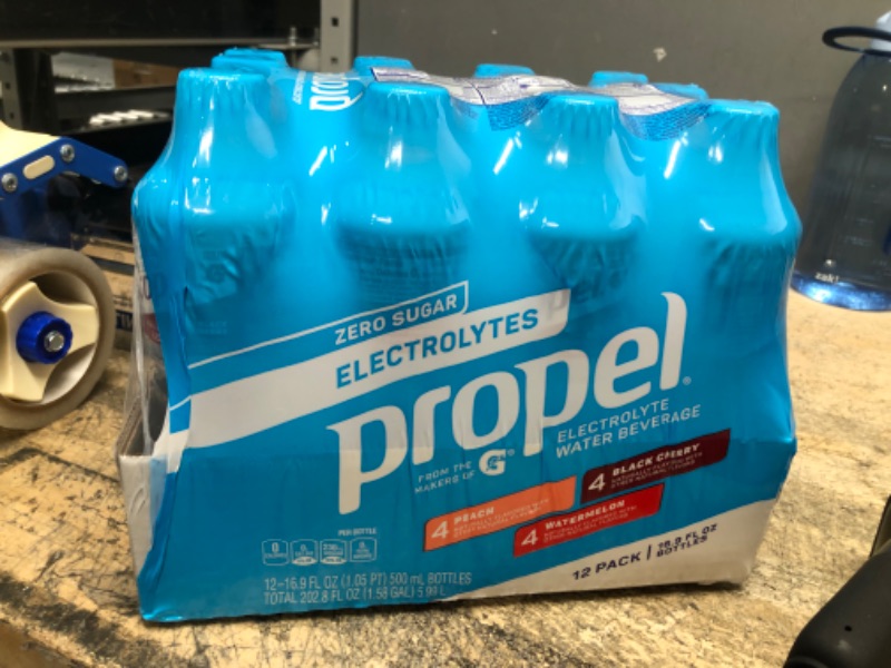 Photo 2 of **EXPIRES MAR 06/2023** Propel, 3 Flavor Variety Pack 2.0, Zero Calorie Sports Drinking Water with Electrolytes and Vitamins C&E, 16.9 Fl Oz (12 Count) Peach - Variety Pack