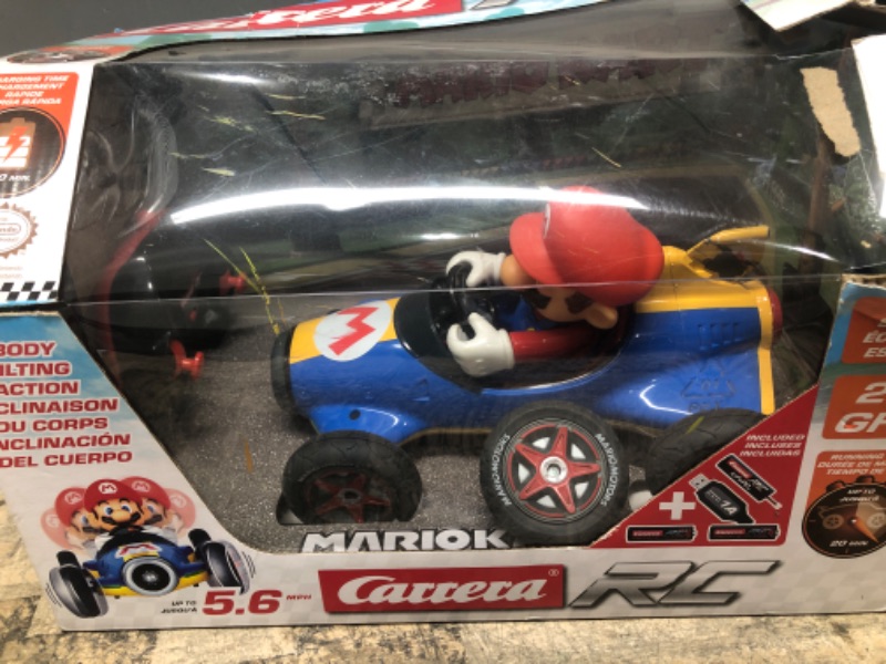 Photo 2 of **TIRE FELL OFF** Carrera 181066 RC Official Licensed Kart Mach 8 Mario 1: 18 Scale 2.4 Ghz Remote Radio Control Car with Rechargeable Lifepo4 Battery - Kids Toys Boys/Girls Mario Kart Mach 8 - Mario