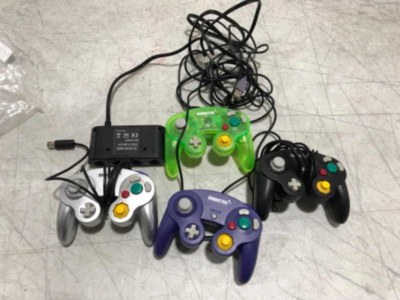 Photo 2 of EVORETRO Gamecube Controller Compatible for Switch, wii Console and PC Games - 4 Pack Bundle with 4 Extension Cords and a 4-Port Adapter