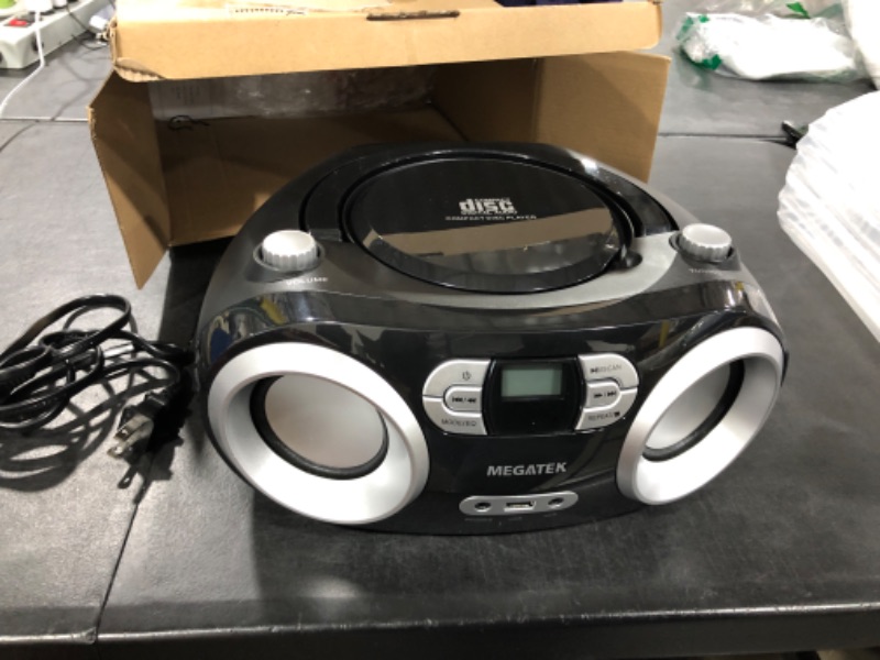 Photo 2 of MEGATEK Portable CD Player/Radio/Bluetooth Boombox with Enhanced Stereo Sound, CD-R/CD-RW/MP3/WMA Playback, USB Port, AUX Input, Headphone Jack, Backlit LCD Display, AC/Battery Operated Black