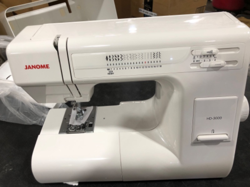 Photo 1 of Janome HD3000 Heavy Duty Sewing Machine w/Hard Case + 1/4" Seam Foot + Blind Hem Foot + Overedge Foot + Rolled Hem Foot + Zipper Foot + Buttonhole Foot + Leather and Universal Needles + More!
