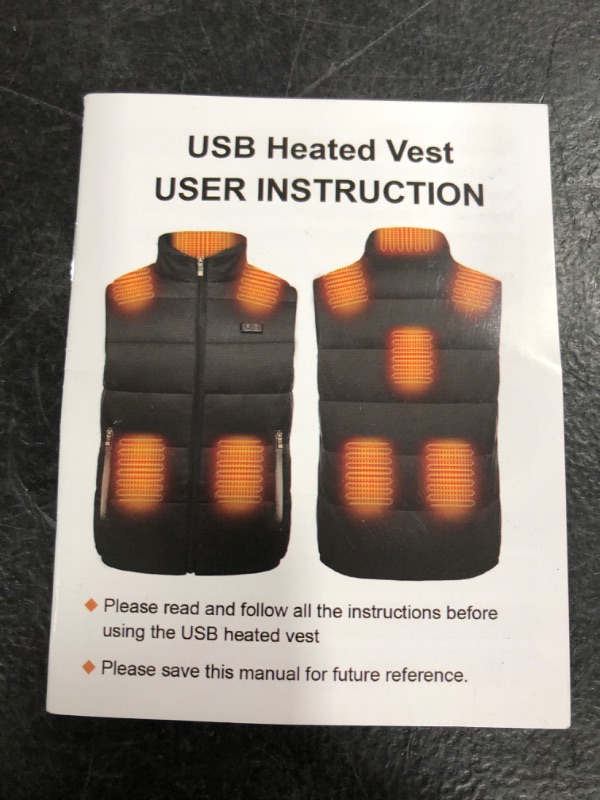 Photo 2 of HEATED VEST SIZE L 
USED