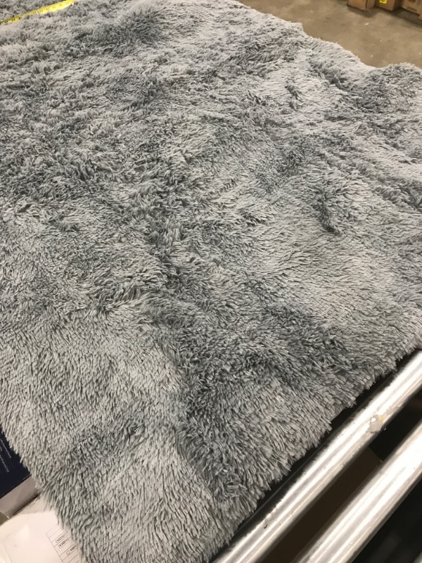 Photo 1 of 70" X 49" FUZZY GRAY AREA RUG