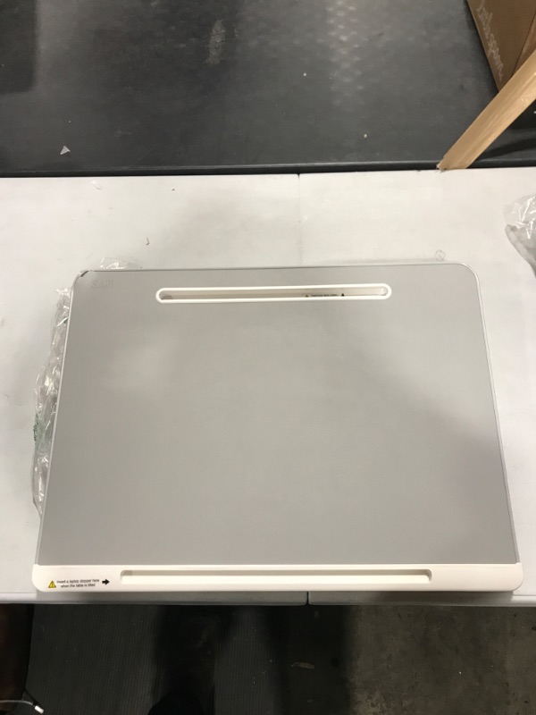 Photo 2 of Amazon Basics Adjustable Laptop Tray Table - Lap Desk Fits Medium Laptop
