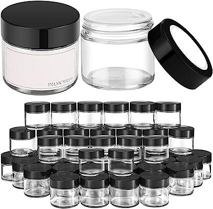 Photo 1 of 2 oz Glass Jars, Bumobum 48 Pack Cream Jars with Black Lids, White Labels & Inner Liners, Empty Round Clear Cosmetic Containers for Cream, Lotion
