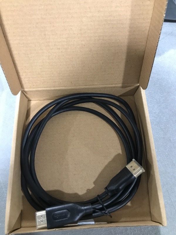 Photo 2 of AmazonBasics DisplayPort to HDMI Display Cable - 6 Feet