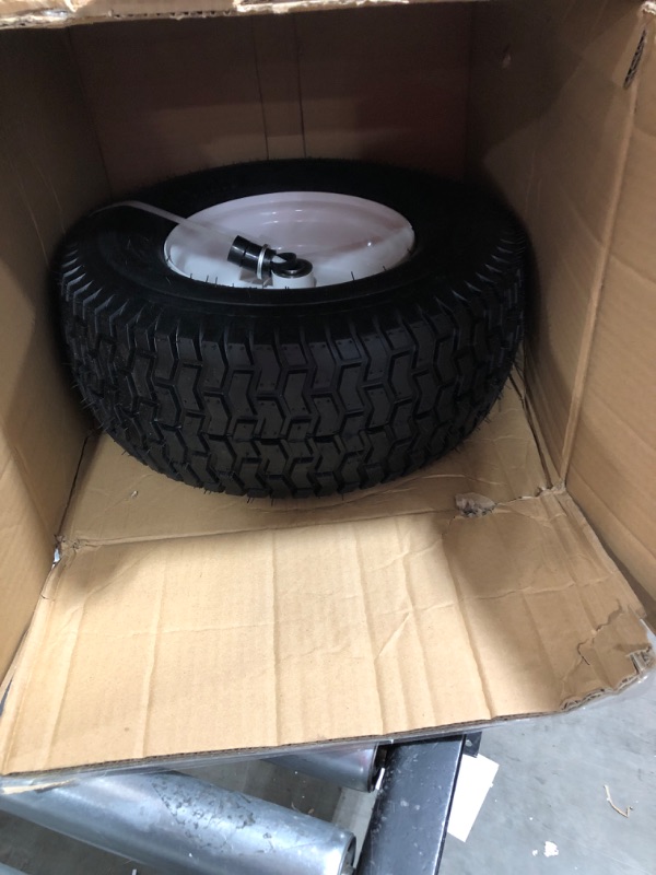 Photo 4 of 16x6 black tire white rim pair for unknown vehicle
