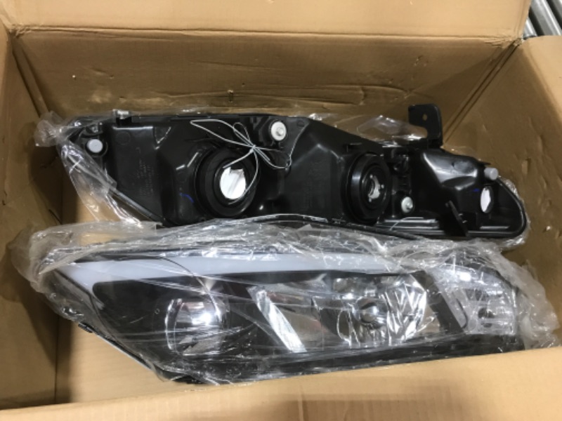 Photo 1 of AUTOMOTIVE HEADLIGHTS PAIR MODEL NO. CTLAHL-1171 UNKNOWN VEHICLE FITMENT