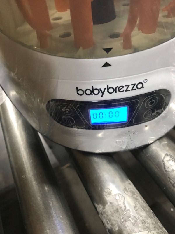 Photo 1 of Baby Brezza Baby Bottle Sterilizer and Dryer Machine – Electric Steam Sterilization - Universal Fit - Pacifiers, Glass, Plastic, and Newborn Feeding Bottles