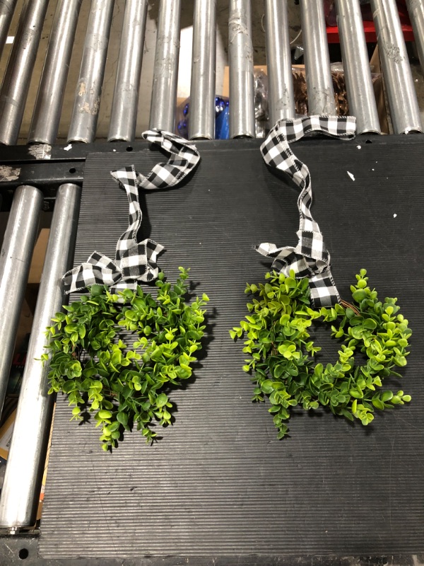 Photo 2 of 2 Pack Kitchen Cabinet Wreaths Decoration- 6 Inch Artificial Christmas Hanging Boxwood Wreath with Green Leaves Black & White Buffalo Plaid Bow Ribbon for Kitchen Cabinet Front Door Farmhouse Decors Black & white