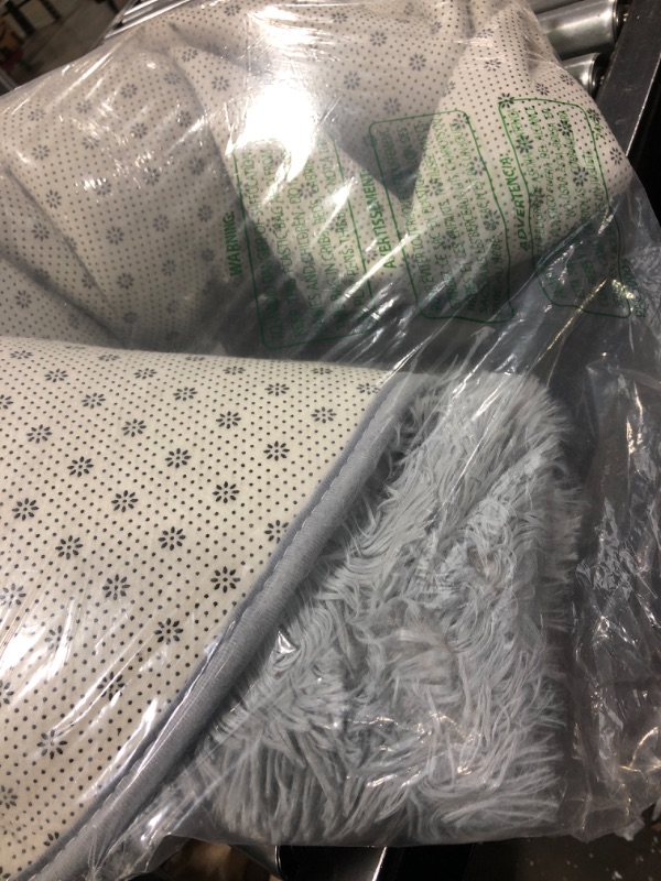 Photo 1 of FJZFING Grey Round Rug Ultra-Soft Plush Modern 7x7 Circle Area Rug for Kid's Bedroom, Fluffy Shag Circular Rug for Nursery Room, Non-Slip Home Decor Cute Grey Carpet for Teen's Room 7x7 Feet Grey