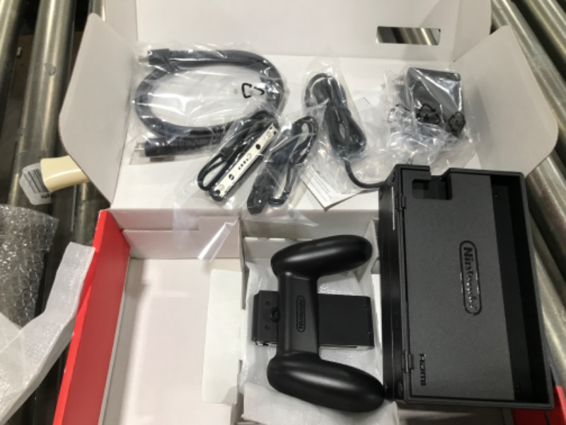 Photo 1 of Nintendo Switch with Neon Blue and Neon Red Joy?Con