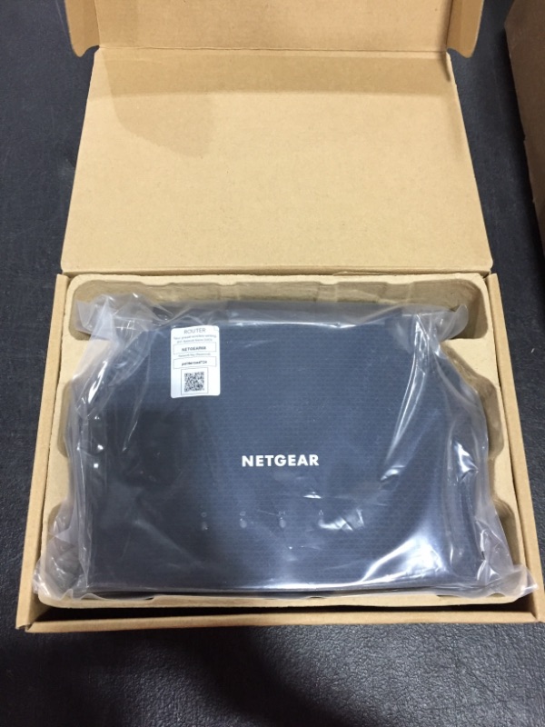 Photo 2 of NETGEAR 4-Stream WiFi 6 Router (R6700AXS) – with 1-Year Armor Cybersecurity Subscription - AX1800 Wireless Speed (Up to 1.8 Gbps) | Coverage up to 1,500 sq. ft., 20+ devices, AX WiFi 6 w/ 1yr Security