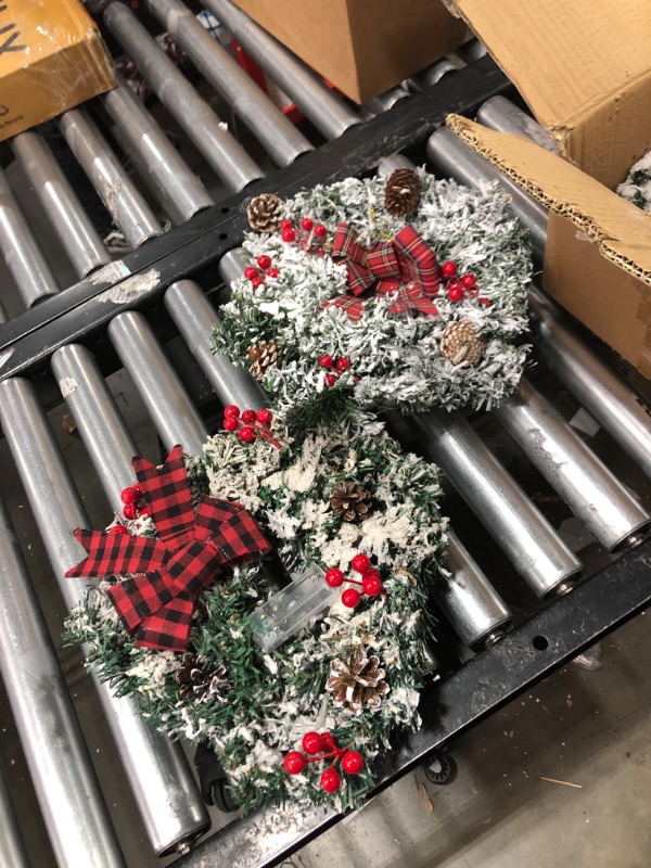 Photo 1 of 3 Pack Snow Flocked Prelit Christmas Wreaths with Lights Bows Pinecone Red Berry Battery Operated Artificial Xmas Wreath Decorations for Front Door Window Wall Cabinets Outdoor Indoor Home(13 Inch) https://a.co/d/5mpRRP2