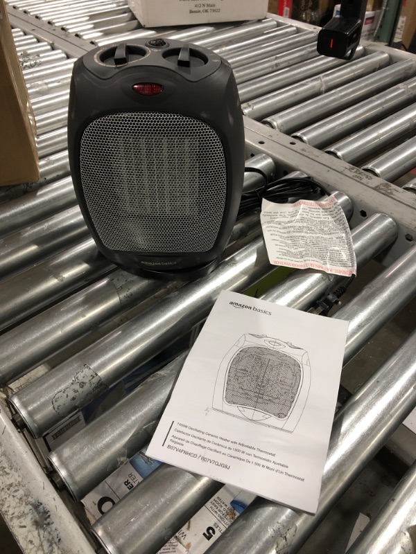 Photo 1 of Amazon Basics 1500W Oscillating Ceramic Heater with Adjustable Thermostat, Black
