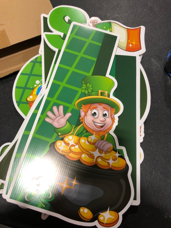 Photo 2 of 8 Pieces St. Patrick's Day Yard Sign 16 x 12 Inch St. Patrick's Day Outdoor Lawn Decorative Sign Shamrock Garden Sign with Plastic Stakes for St. Patrick's Day Outdoor Decorations 