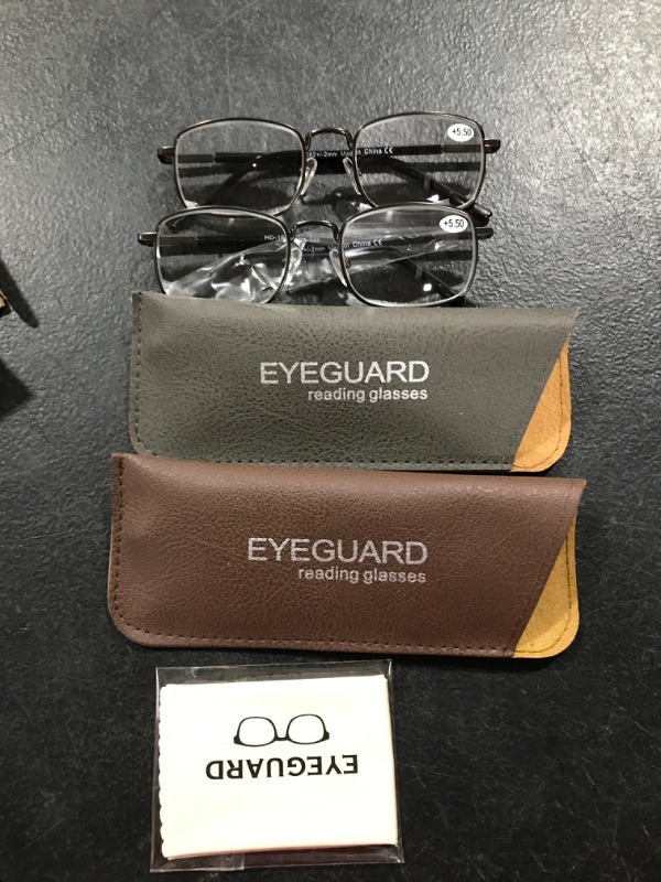 Photo 1 of 2 pairs of glasses with cases