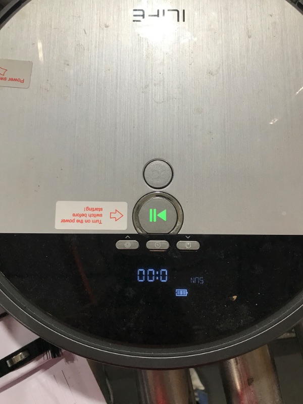 Photo 1 of ILIFE V8s Robot Vacuum and Mop Combo, Big 750ml Dustbin, Enhanced Suction Inlet, Zigzag Cleaning Path, LCD Display, Schedule, Self-Charging Robot Vacuum Cleaner, Ideal for Hard Floor and Pet Hair.-- dirty on top of product