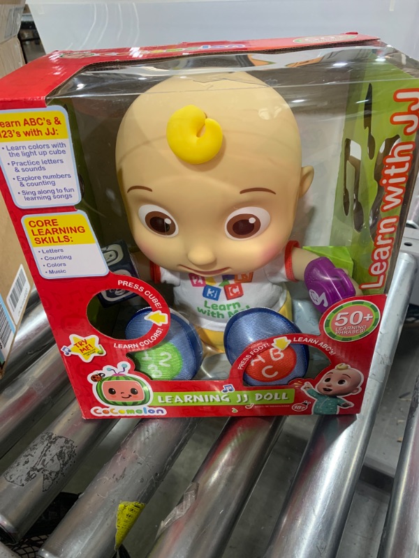 Photo 2 of CoComelon Interactive Learning JJ Doll with Lights, Sounds, and Music to Encourage Letter, Number, and Color Recognition, Kids Toys for Ages 18 Month