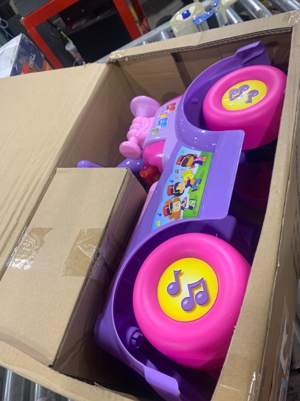 Photo 2 of Fisher Price Music Parade Purple Ride-On with 5 Different Marching Tunes! [Amazon Exclusive]