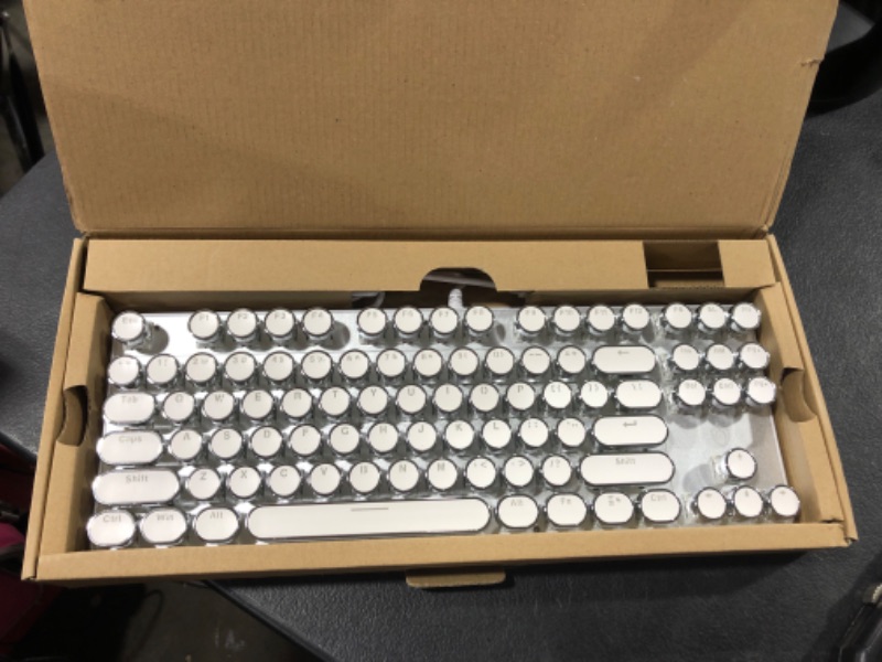 Photo 1 of Round button keyboard silver and white