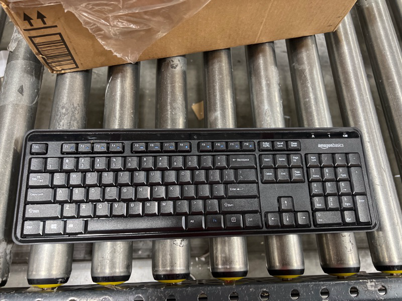 Photo 2 of Amazon Basics Wireless Computer Keyboard and Mouse Combo - Quiet and Compact - US Layout (QWERTY)