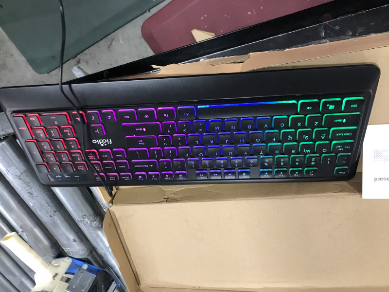 Photo 2 of Fiodio Rainbow Membrane Gaming Keyboard, Quiet Wired Computer Keyboard, 104 Silent & 26 Anti-Ghosting Keys, Spill Resistant, Multimedia Control for PC and Desktop