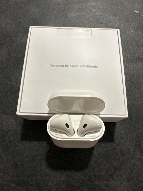 Photo 2 of Apple AirPods with Charging Case (Latest Model)