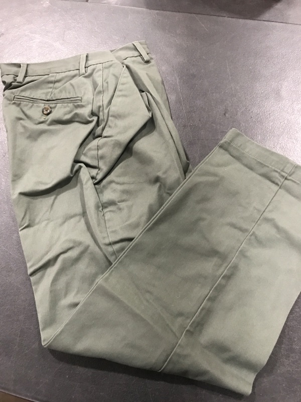 Photo 2 of Amazon Essentials Men's Classic-Fit Wrinkle-Resistant Flat-Front Chino Pant (Available in Big & Tall) 32W x 29L Olive