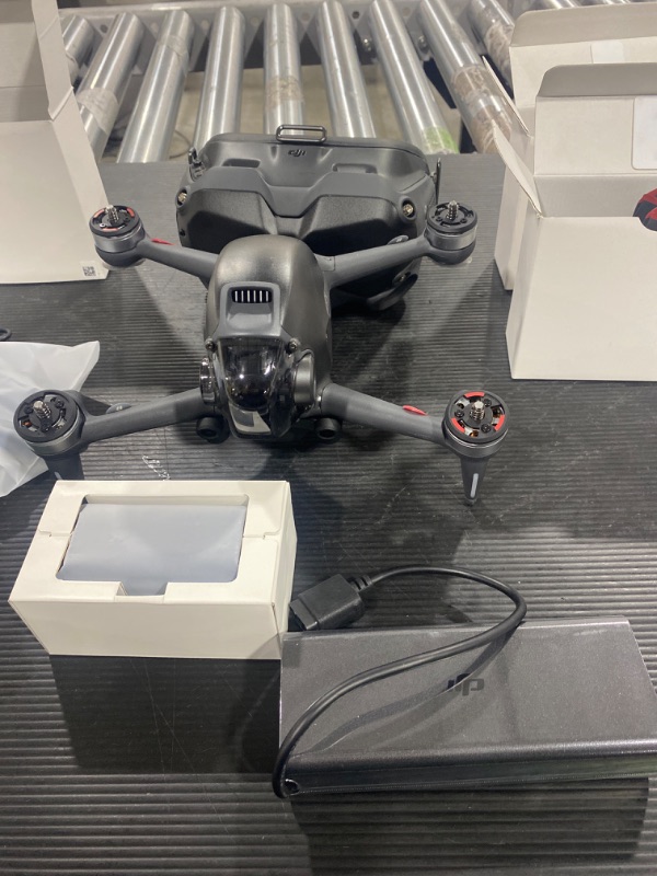 Photo 6 of DJI FPV Combo with Motion Controller - First-Person View Drone Quadcopter UAV with 4K Camera, S Flight Mode, Super-Wide 150° FOV, HD Low-Latency Transmission, Emergency Brake and Hover, Gray DJI FPV Combo + Motion Controller