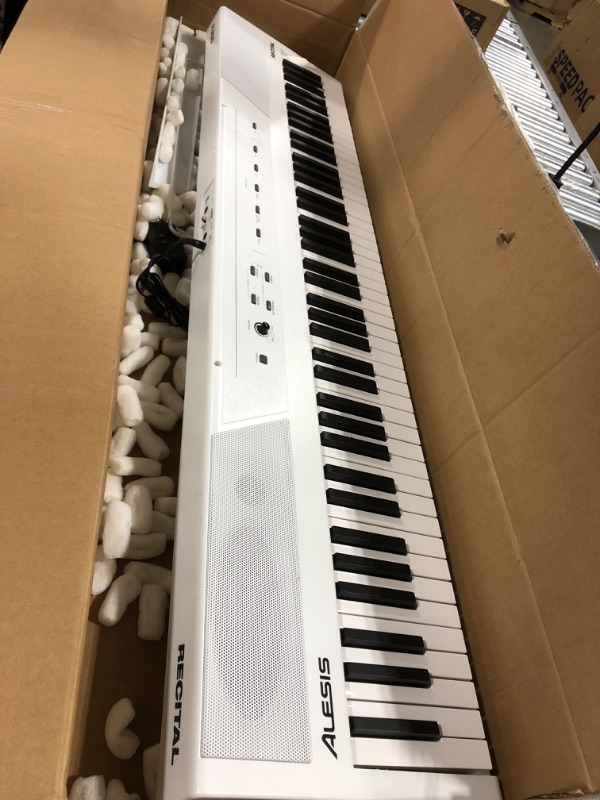 Photo 2 of Alesis Recital – 88 Key Digital Piano Keyboard with Semi Weighted Keys, 2x20W Speakers, 5 Voices, Split, Layer and Lesson Mode, FX and Piano Lessons
