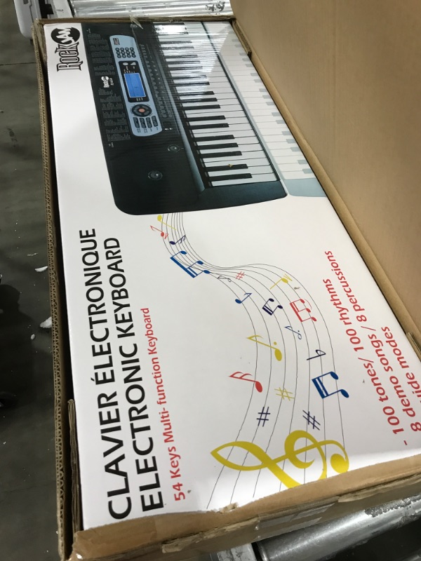 Photo 1 of RockJam 54-Key Portable Electronic Keyboard with Interactive LCD Screen & Includes Piano Maestro Teaching App with 30 Songs & Adjustable Keyboard Stand with Locking Straps & Quick Release Mechanism