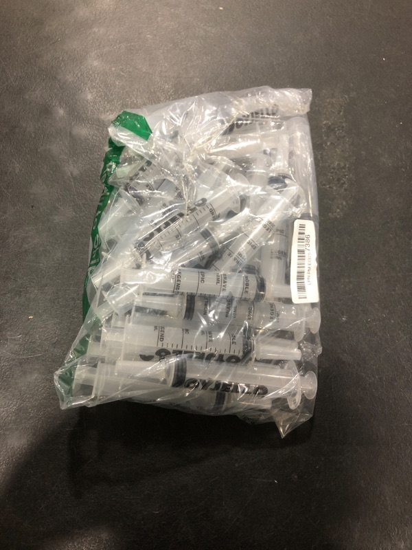 Photo 1 of  Plastic Syringe with Measurement Liquids Measuring Syringes 