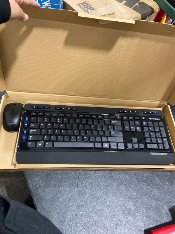 Photo 2 of Amazon Basics Wireless Computer Keyboard and Mouse Combo - Full Size - US Layout (QWERTY) & Gel Computer Mouse Pad with Wrist Support Rest