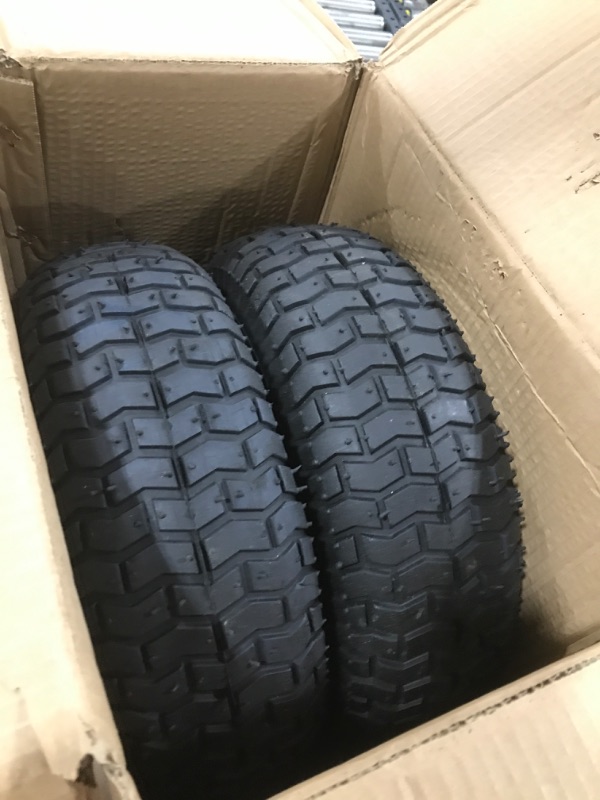 Photo 2 of (2-Pack) 16x6.50-8 Pneumatic Tires on Rim - Universal Fit Riding Mower and Yard Tractor Wheels - With Chevron Turf Treads - 3” Centered Hub and 3/4” Bushings - 615 lbs Max Weight Capacity