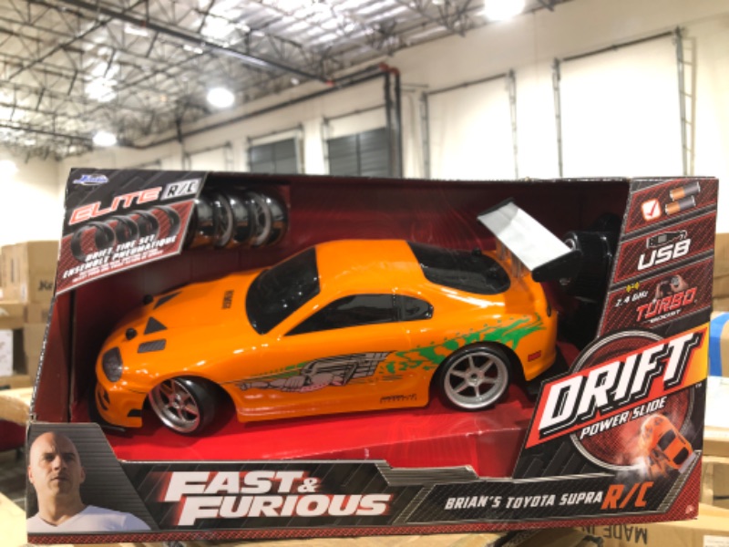 Photo 2 of Jada Toys Fast & Furious 1:10 Toyota Supra Remote Control Car Drift Slide RC with Extra Tires 2.4GHz, Toys for Kids and Adults