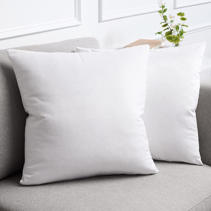 Photo 1 of 2 WHITE THROW PILLOWS