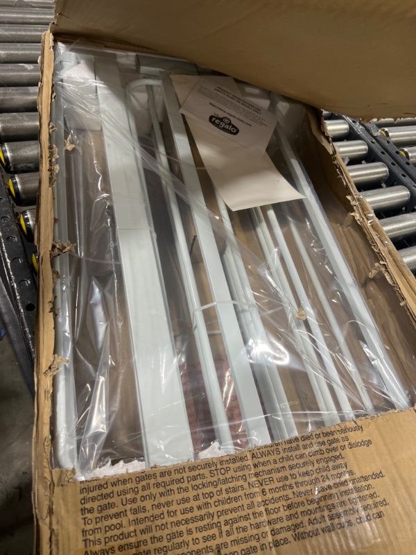 Photo 1 of Regalo 56-Inch Extra WideSpan Walk Through Baby Gate, Includes 4-Inch, 8-Inch and 12-Inch Extension, 4 Pack of Pressure Mounts and 4 Pack of Wall Cups and Mounting Kit, White 56" Wide