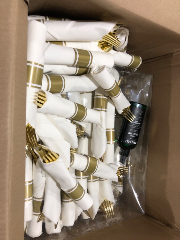 Photo 1 of  Gold Plastic Silverware With Pre Rolled Napkins