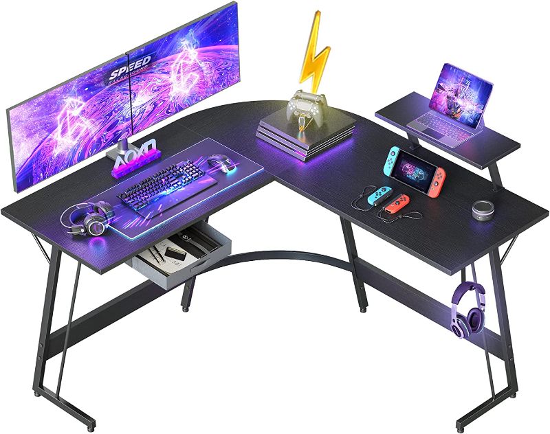 Photo 1 of CubiCubi L Shaped Desk, Computer Corner Gaming Desk with Large Monitor Stand, 51.2" Home Office Writing Table, Workstation with Storage Drawer, Space-Saving, Black **STORE SEALED**
