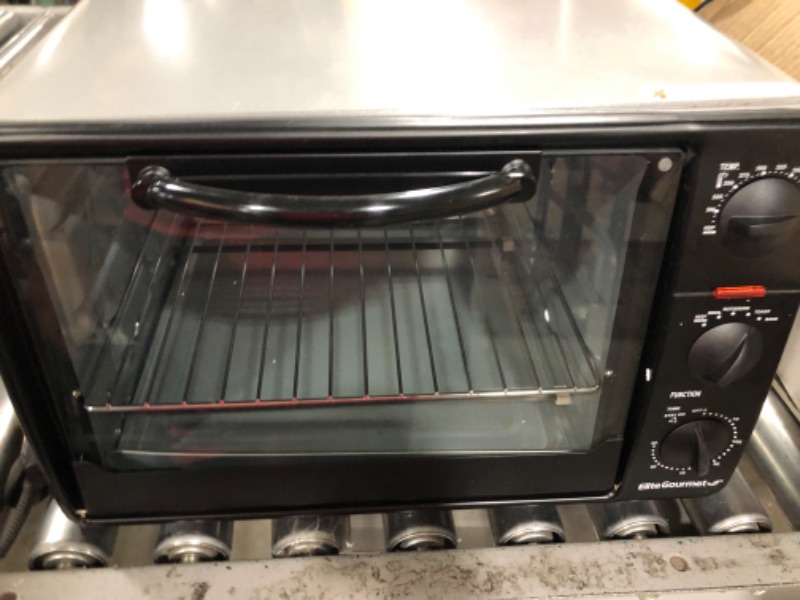 Photo 1 of Elite Gourmet ERO-2008NFFP Countertop XL Toaster Oven Rotisserie, Bake, Grill, Broil, Roast, Toast, Keep Warm and Steam, 23L capacity fits a 12” pizza, 6-Slice, Black 6-Slice, 23 L With Rotisserie