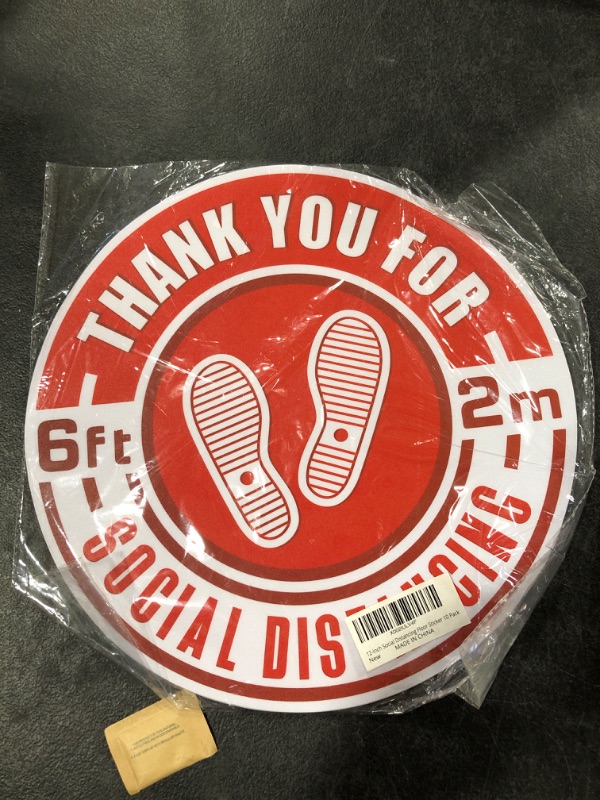 Photo 1 of 12-inch Social Distancing Floor Stickers. 10pk