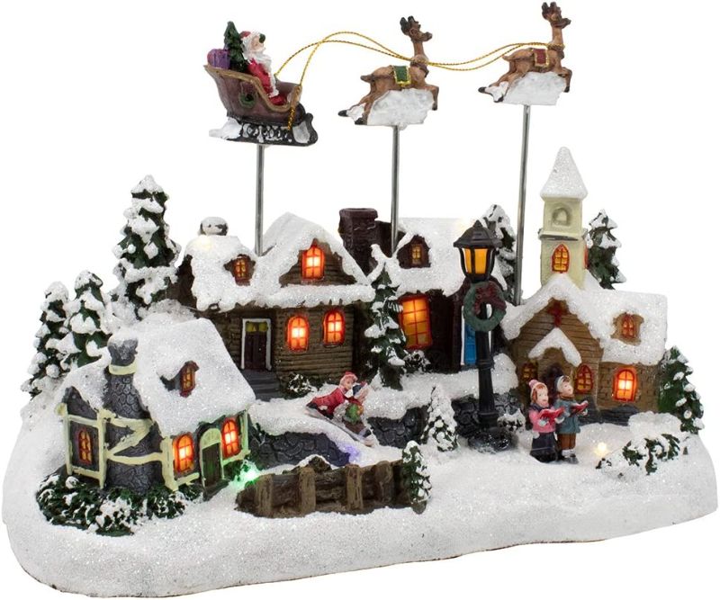 Photo 1 of Battery Operated Musical LED Village with Santa and Deer, 11-Inch
