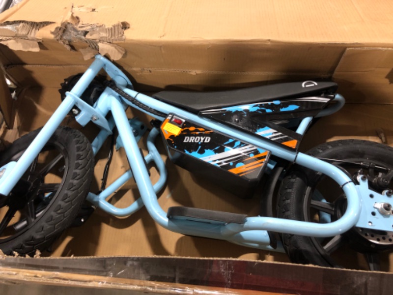 Photo 2 of Droyd Weeler Electric Mini Bike - Electric Bike for Kids Ages 6 & Up - 200W Electric Dirt Bike w 6.2-10MPH up to 8 Miles - Dirt Bike for Kids up to 45 Mins Run Time w 14in Tire, 24V 8Ah Battery Blue