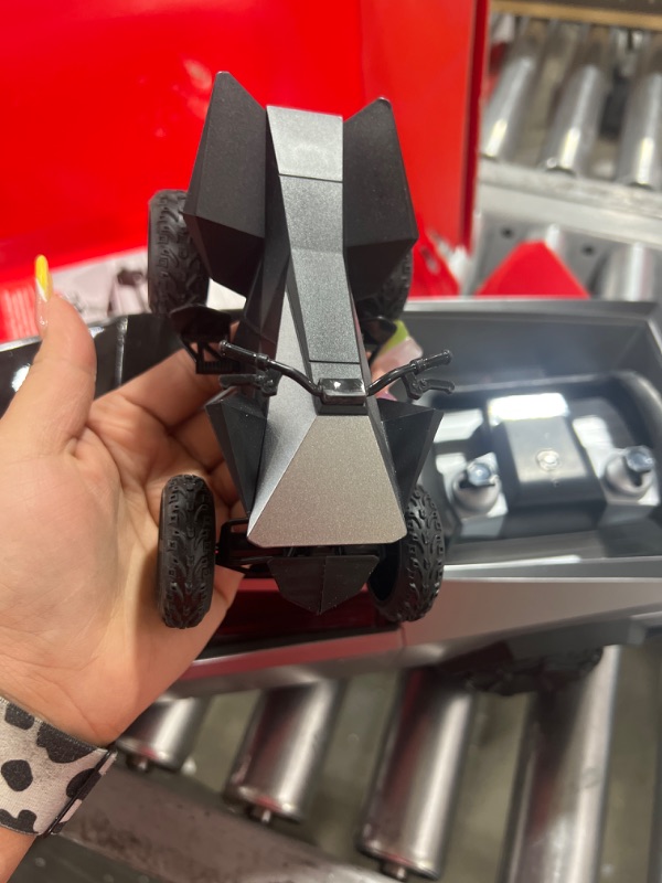 Photo 1 of Hot Wheels RC 1:10 Tesla Cybertruck Radio-Controlled Truck & Electric Cyberquad, Custom Controller, Speeds to 12 MPH, Working Headlights & Taillights, for Kids & Collectors [Amazon Exclusive]