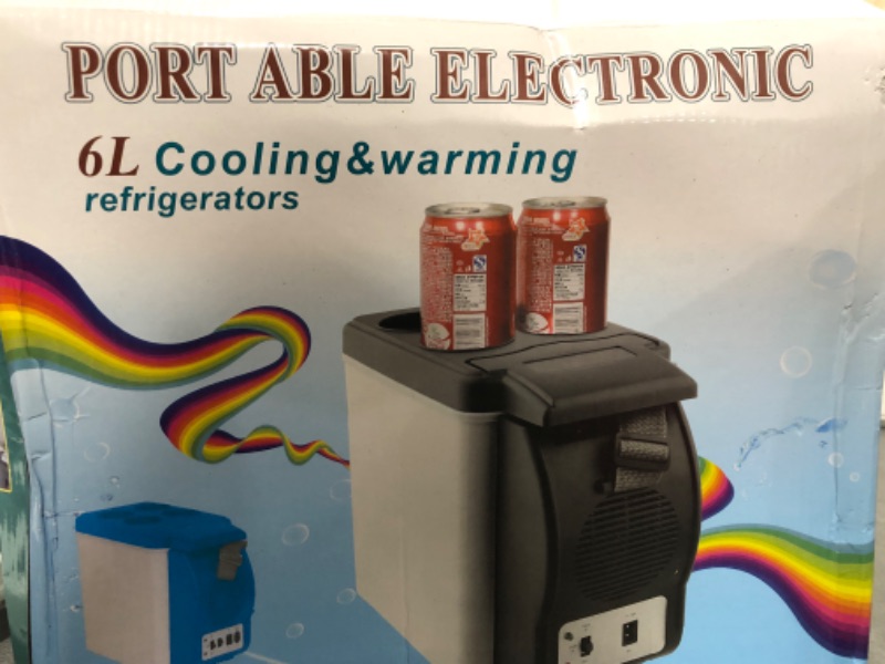 Photo 1 of Portable Electronic Cooling & Warming Refrigerator