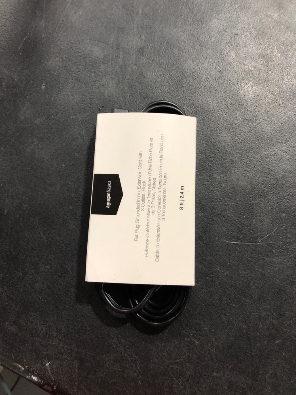 Photo 1 of Amazon Basics 8-Foot 3-Prong Flat Plug Grounded Indoor Extension Cord with 3 Outlets - 13 Amps, 1625 Watts, 125 VAC - Black Black 8 ft Power Strip